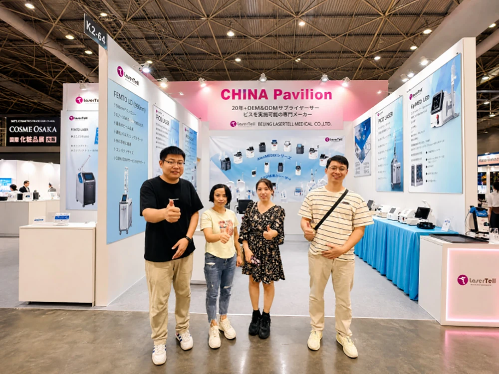 LaserTell team giving thumbs up at Booth K2-64 during COSME OSAKA 2023 aesthetic equipment exhibition