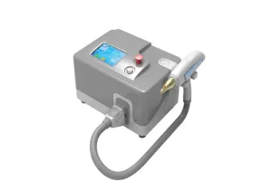 portable q switched nd yag laser machine for tattoo removal pigment and carbon peeling treatment white background studio shot